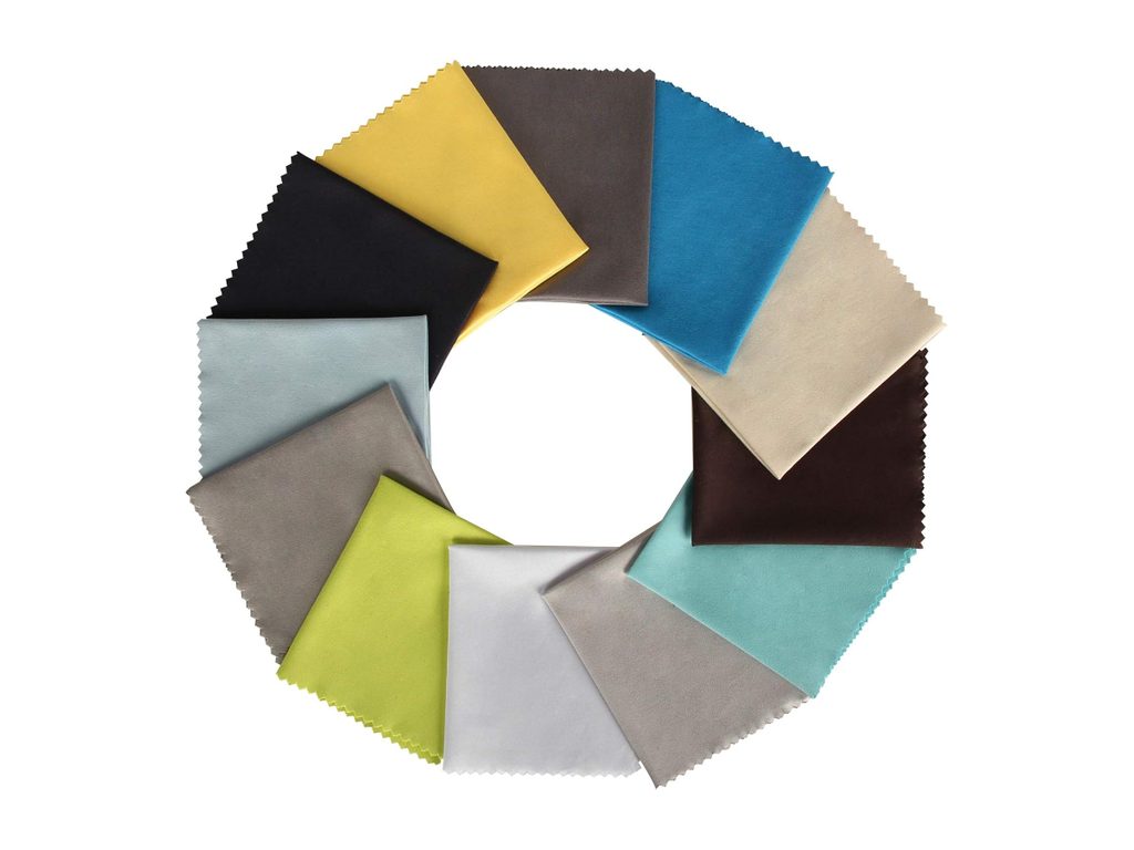 Twelve square microfibre cloths with pinked edges fanned out in a ring of different colours